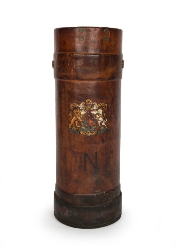 An antique English powder charge, brown leather with applied coat of arms, 19th/20th century, 52cm high, 19cm diameter