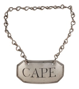 "CAPE" sterling silver Georgian decanter label by John Rich of London, circa 1795. Cape is a wine produced in the South African Cape province, and decanter labels bearing this name are extremely scarce indeed. 4cm wide