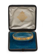 An elegant 18ct yellow gold bangle, set with five natural pearls, by the noted jewellers&nbsp;GODWIN of High Holborn, London, circa 1880s. Housed in original plush fitted box. Godwin traded from this address from 1791 to 1906. 6cm wide, 13.5 grams total