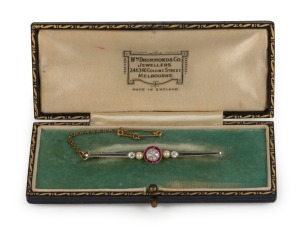 An 18ct yellow and white gold Art Deco bar brooch, set with rubies, diamonds and pearls, circa 1925, 6cm wide, 4.3 grams total