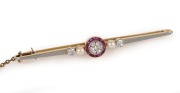 An 18ct yellow and white gold Art Deco bar brooch, set with rubies, diamonds and pearls, circa 1925, ​​​​​​​6cm wide, 4.3 grams total - 2