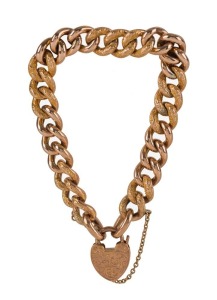 An antique "Day & Night" curb link 9ct yellow gold bracelet in plush box. Made in Birmingham, circa 1904, 18 grams total