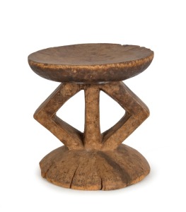 A tribal stool, carved wood, Zambezi Valley, Central African, 29cm high 29cm wide