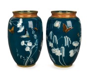 MINTONS stunning pair of pâte-sur-pâte porcelain vases adorned with butterflies and flowers on green ground with gilded highlights, 19th century, stamped "Mintons", monogram in pates "T.R.", 25.5cm high