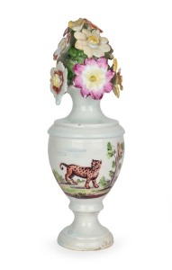 LONGTON HALL early English porcelain urn, decorated with floral landscape and leopard, finely finished with applied floral bouquet, circa 1765, 19cm high. PROVENANCE: Stheby's Auction, 2008