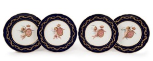 MINTONS fine set of four cabinet plates, cobalt blue borders with floral gilt decoration and hand-painted central Putti, by Antonin Boullemier, retailed by Mortlock's, Oxford Street, London, circa 1890, 24cm diameter