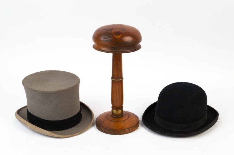 An antique timber shop display hat stand together with an antique top hat and bowler hat 19th/20th century (3 items),  the hat block 34cm high 