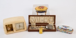 Two porcelain jewel boxes, a Dutch sugar spoon in box, and a Bakelite musical clock with dancing figure, (4 items), the clock 12cm wide