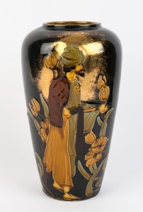 An English pottery Art Nouveau vase with Persian figure amongst flowers, circa 1900, 30.5cm high