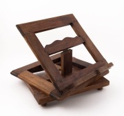 A folding timber bookstand on a revolving base, 20th century, 30cm wide