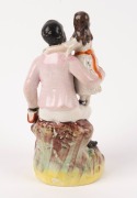 "UNCLE TOM & EVA" Staffordshire pottery statue, circa 1850s, 21cm high - 2