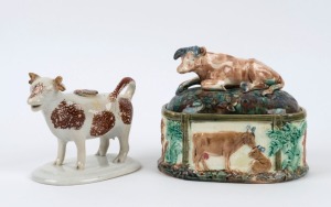 Staffordshire pottery cow creamer, together with a butter dish with cow lid, 19th century, the creamer 12cm high, 15cm long