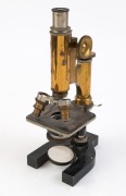 An antique brass microscope in original fitted mahogany case, 19th century, the case 37cm high - 2