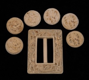 A Chinese carved ivory belt buckle, together with a set of six carved ivory buttons, early 20th century, (7 items), the buckle 7cm high