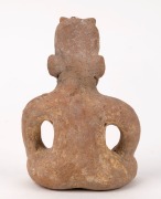 A Columbian pottery statue of a seated figure, 14.5cm high - 2