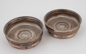 A pair of antique English old Sheffield plate wine bottle coasters, 19th century, 5cm high, 14cm diameter