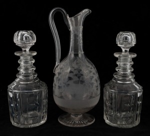 An antique English claret jug with fern etched decoration, together with a pair of crystal decanters, 19th century, (3 items), ​​​​​​​the jug 29.5cm high