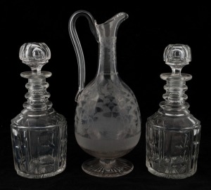 An antique English claret jug with fern etched decoration, together with a pair of crystal decanters, 19th century, (3 items), the jug 29.5cm high