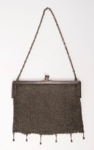 An antique silver mesh purse, 19th/20th century, 15cm wide, 176 grams total