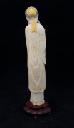 A Chinese carved ivory statue of an old man, on wooden stand, early to mid 20th century, 28cm high overall - 2