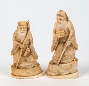 A pair of Chinese carved ivory statues of scholars, 19th/20th century, 13cm and 11cm high 