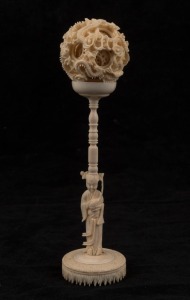 A Chinese carved ivory puzzle ball, early to mid 20th century, 20.5cm high overall