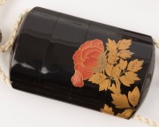 A fine Japanese black lacquered inro&nbsp;with decorative metal&nbsp;ojime&nbsp;and red lacquered netsuke, Meiji period, the inro&nbsp;8.5cm high - 2