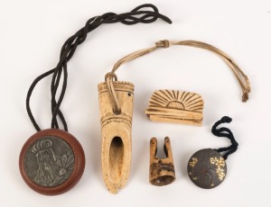 Five small Japanese artefacts, carved bone, wood and metal ware, 19th and 20th century, the largest 8cm long