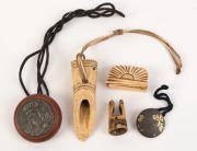 Five small Japanese artefacts, carved bone, wood and metal ware, 19th and 20th century, ​​​​​​​the largest 8cm long