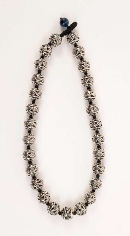 Chinese silver bead necklace, threaded on black silk knotted cord with glass bead clasp, ​​​​​​​48cm long