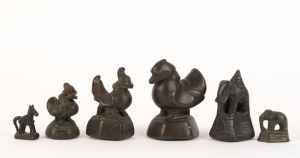 Six assorted Burmese anthropomorphic cast bronze opium weights, the largest 5.5cm high
