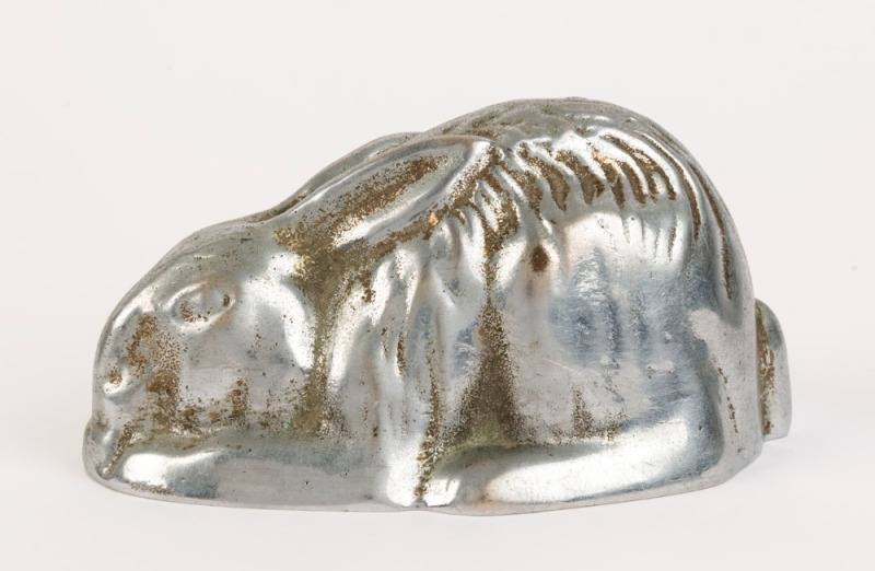 A cast metal rabbit doorstop, early 20th century, ​​​​​​​9cm high, 18cm long