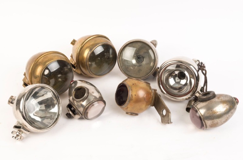 AUTOMOTIVE LIGHTS. Group of eight antique and vintage examples including three pairs, early to mid 20th century, ​​​​​​​the largest 14cm long