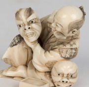 A Japanese carved marine ivory statue of the mask maker, 20th century, ​​​​​​​6cm high - 4
