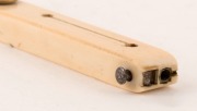 An antique quill cutter, ivory and brass, 19th century, stamped "RODGERS, CUTLERS TO HER MAJESTY", 10.5cm long - 2