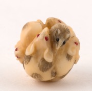 Three antique Japanese carved ivory ojime beads, Meiji period, 19th century, the largest 2cm high. PROVENANCE: The Berry Collection, Melbourne, Young's Auctions, 2008 - 4