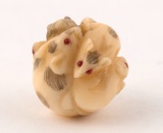 Three antique Japanese carved ivory ojime beads, Meiji period, 19th century, the largest 2cm high. PROVENANCE: The Berry Collection, Melbourne, Young's Auctions, 2008 - 5