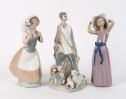 LLADRO&nbsp;statue of a girl in a pink dress, and two Nao&nbsp;Spanish porcelain statues, 20th century, ​​​​​​​the largest 26cm high