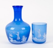 MARY GREGORY blue glass carafe and beaker 20th century,&nbsp; the carafe 18cm high&nbsp;
