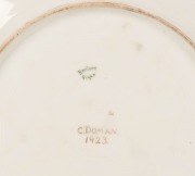 A hand-painted porcelain cabinet plate with classical scene, signed "C. Doman, 1923", 25.5 cm wide - 2