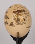 An antique Japanese gold lacquered decorated ostrich egg ornament on original lacquered stand shaped as a bird claw, Meiji period, 19th century, 26cm high. PROVENANCE: Purchased at Christie's Auctions South Kensington, London in the late 1980s for $2000. - 3