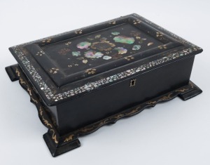 An antique English papier-mâché writing slope with mother of pearl floral inlay and gilt lacquered decoration, internal leather writing surface, (lock and pen rest missing), circa 1870, 10cm high, 30cm wide, 25cm deep