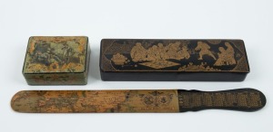 A selection of papier-mâché lacquer ware, including a Chinese lidded pen box, an advertising letter opener by THE EASTERN TELEGRAPH COMPANY, and a hand-painted and transfer decorated jewellery box, (3 items), the largest 34cm long  