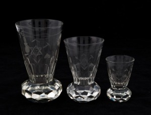 FREEMASONARY: A set of three graduated Masonic firing glasses representing the master, senior and junior warden, with hand-cut wheel decoration, from the Heidelberg lodge, Melbourne, circa 1880, the larger 14cm high