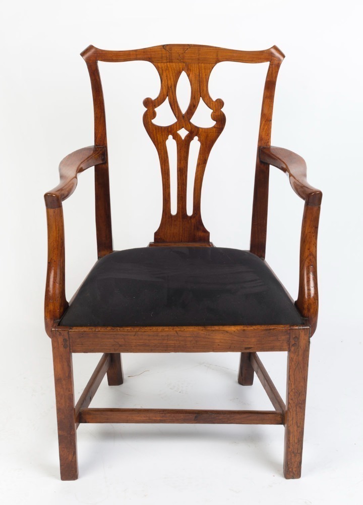 A Chippendale elm armchair with fretted vase shaped back splat