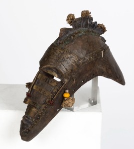 A headdress mask, carved wood, metal, fibre and beads, Marka tribe, Northwest Mali, 45cm high