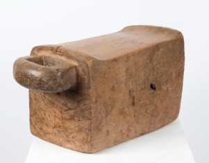 A Baule tribal stool, carved wood with handle, Ivory Coast origin, 43cm high