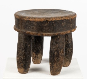 A milking stool, carved wood, Senufo tribe, West Africa, 28cm high