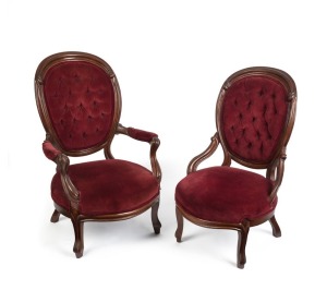 A pair of antique English mahogany salon chairs, circa 1885, the larger 104cm high, 64cm across the arms