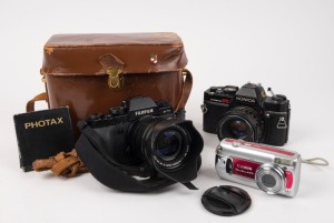 Three assorted cameras including FUJIFILM XT1 mirror-less camera and a filter, (4 items).